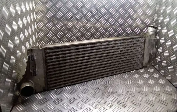Renault Megane II Intercooler radiator 8MK376719031