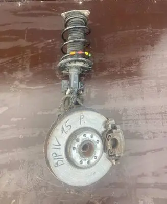 Citroen Berlingo Front shock absorber with coil spring