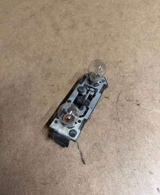 Volkswagen Sharan Tail light bulb cover holder 7M3945257A