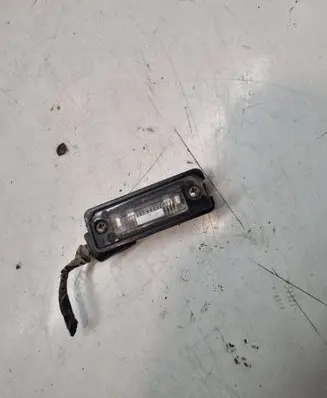 Volkswagen Golf V Number plate light 1J6943021B