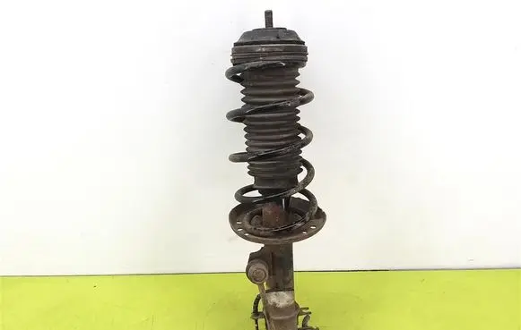 Opel Corsa D Front shock absorber with coil spring