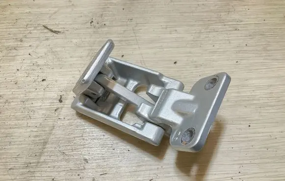 Rear door upper hinge