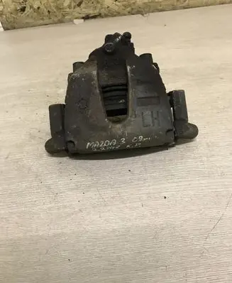 Mazda 3 II Front brake caliper