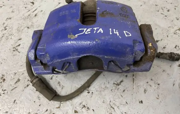 Volkswagen Jetta VI Front brake caliper