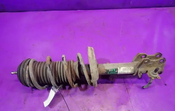 Opel Corsa D Front shock absorber with coil spring 