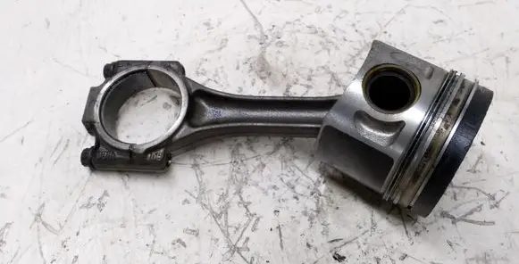 Piston with connecting rod
