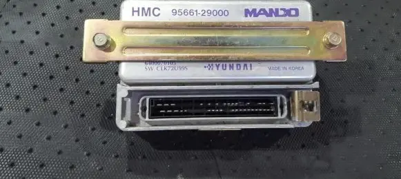 Hyundai Coupe ABS control unit/module 9566129000 6400070105