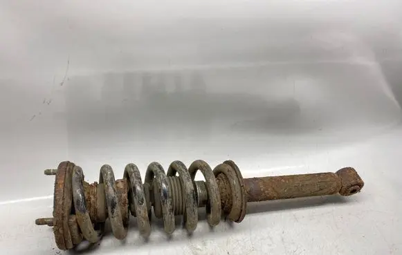 Mitsubishi Pajero Front shock absorber with coil spring
