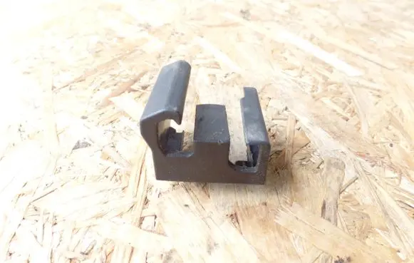 Subaru Legacy Front driver seat rail trim 