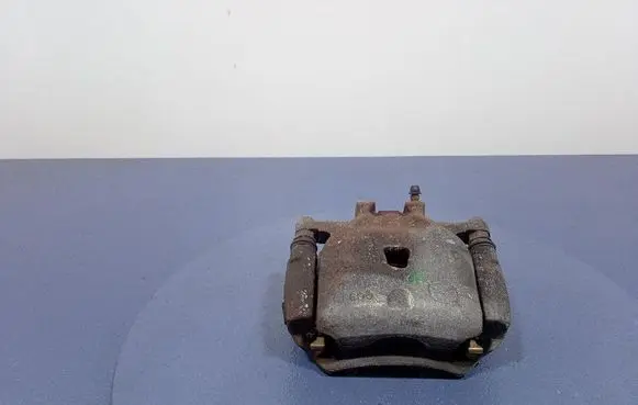 Mazda 3 II Front brake caliper