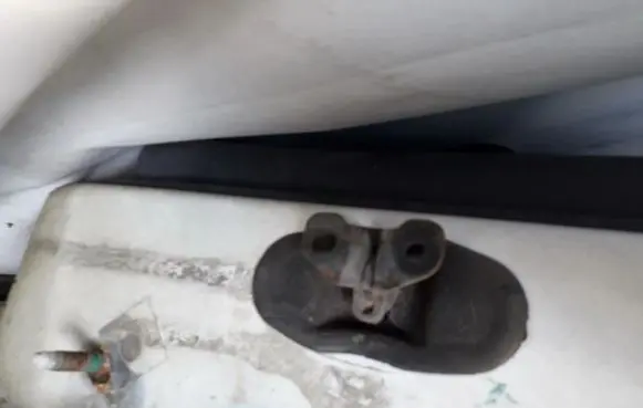 Rear door check strap stopper