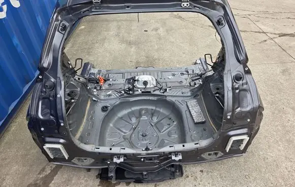 Toyota Yaris XP210 Trunk bottom trim panel 000022