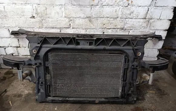 Radiator support slam panel
