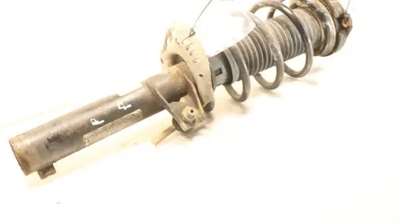 Volkswagen Golf VI Front shock absorber with coil spring
