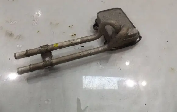 Volkswagen Touran I Engine oil radiator 03C121050B