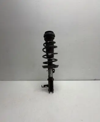 Opel Astra J Front shock absorber with coil spring 13412609