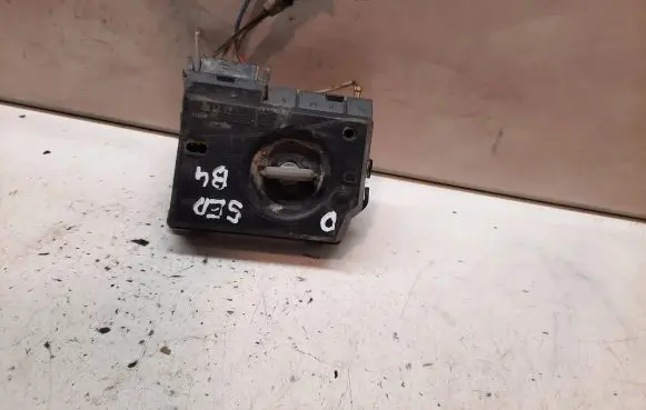 Tail light bulb cover holder