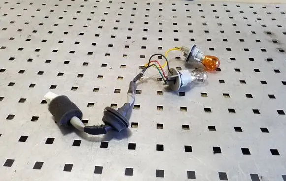 KIA Rio Tail light bulb cover holder
