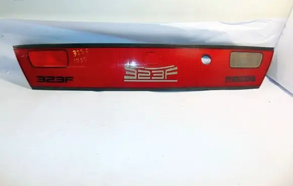 Mazda 323 Trunk door license plate light bar BC6A50850 BC6A51660 BC6A51240