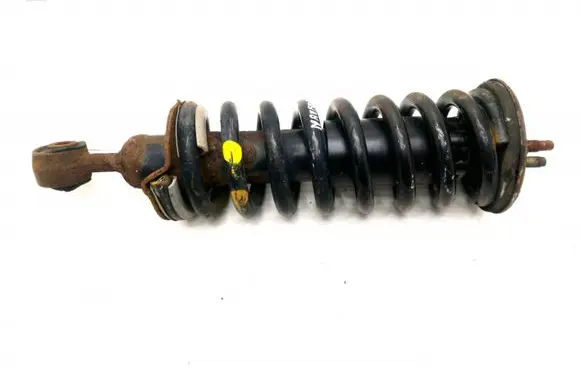 Nissan Navara Front shock absorber with coil spring GERU RUGE