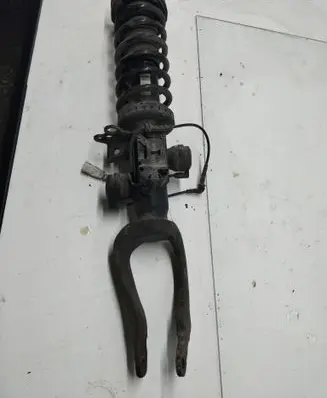 Front shock absorber with coil spring