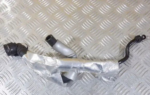 Volkswagen Golf VII Engine coolant pipe/hose 5Q0122073AB