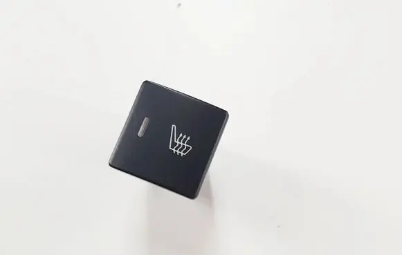 Seat heating switch