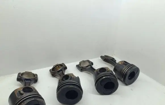 Piston with connecting rod