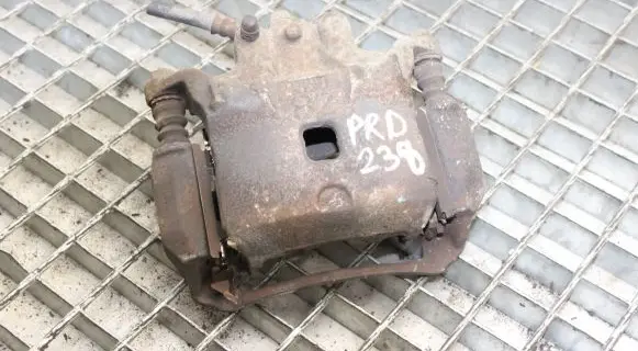 Nissan Juke I F15 Front brake caliper