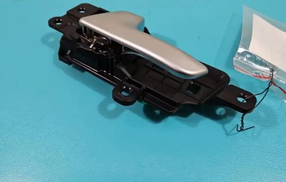 Rear door interior handle