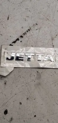 Volkswagen Jetta VI Rear loading door model letters 1k9853687A