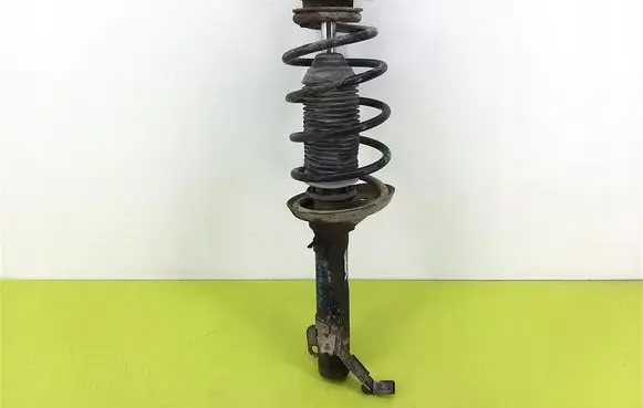 Volkswagen Golf IV Front shock absorber with coil spring 1J0413031S