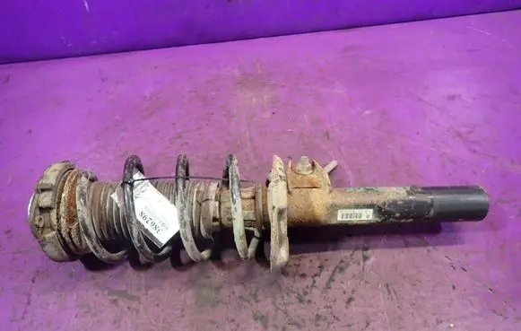 Volkswagen Golf IV Front shock absorber with coil spring 
