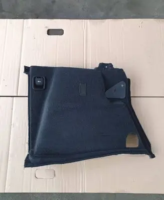 Trunk/boot lower side trim panel