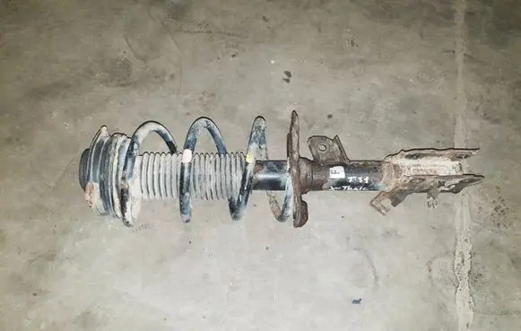 Nissan X-Trail T31 Front shock absorber with coil spring 54303JG72A