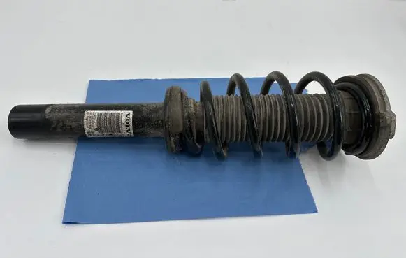 Front shock absorber with coil spring