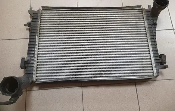 Volkswagen Caddy Intercooler radiator 8ML376746151