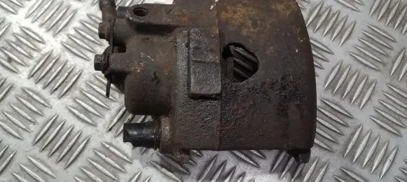 Volkswagen Golf III Front brake caliper