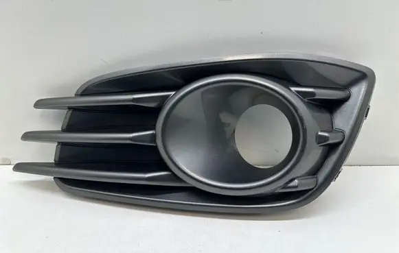 Suzuki Swift I Front fog light trim/grill 7176170L