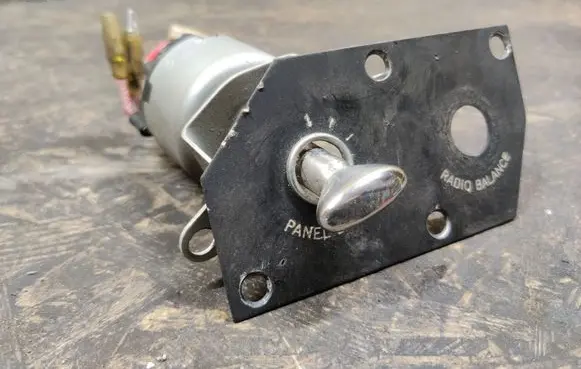 Panel lighting control switch