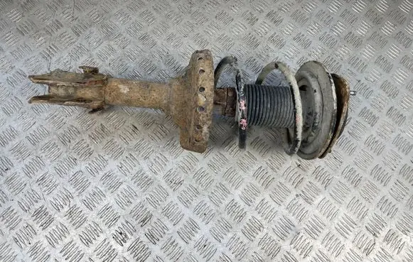 Subaru Legacy Front shock absorber with coil spring