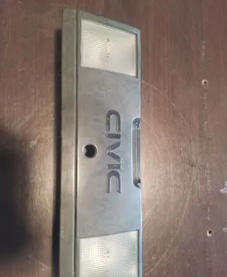 Honda Civic III Trunk door license plate light bar 0163652