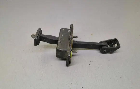 Front door check strap stopper