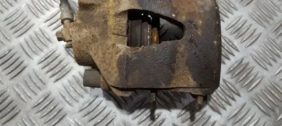 Volkswagen Golf IV Front brake caliper