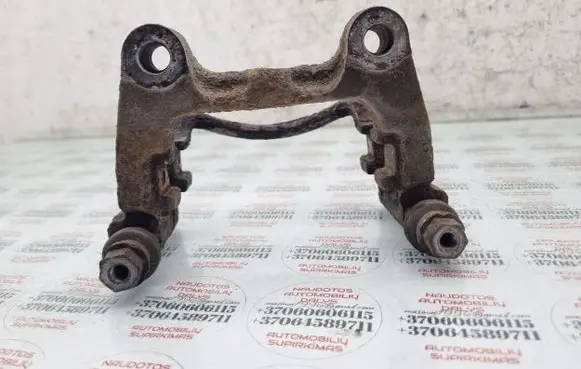 Volkswagen PASSAT B6 Brake caliper pad carrier rear 