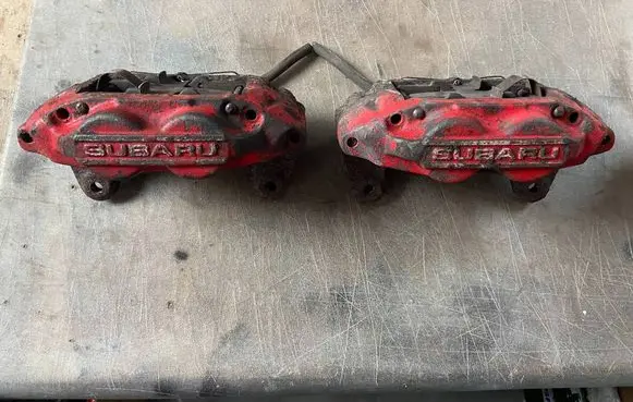 Subaru Impreza II Front brake caliper 