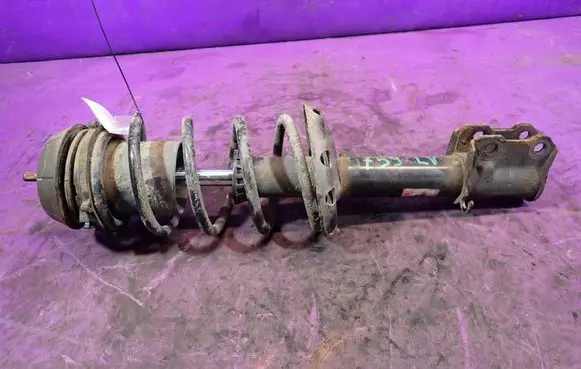 Opel Corsa D Front shock absorber with coil spring 