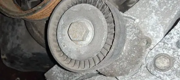 Generator/alternator belt tensioner