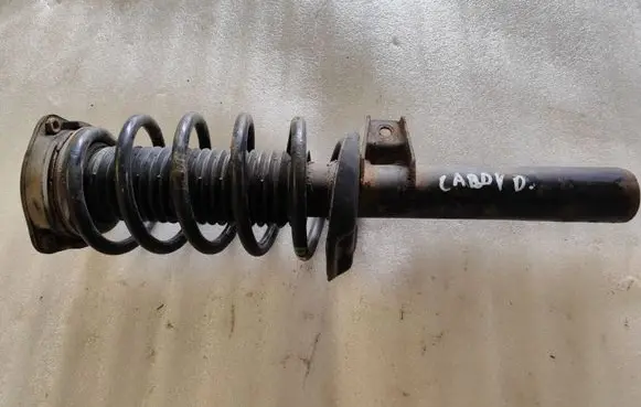 Volkswagen Caddy Front shock absorber with coil spring