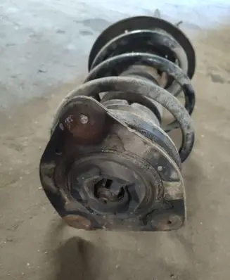 Renault Laguna III Front shock absorber with coil spring